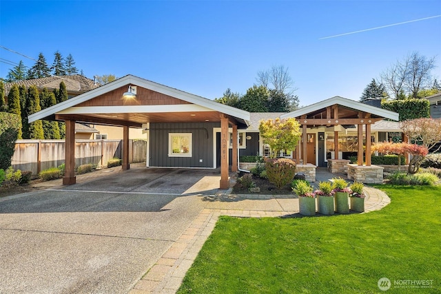 10261 NE 21st Pl, Bellevue, WA 98004 - view of front of home featuring concrete driveway and board and batten siding