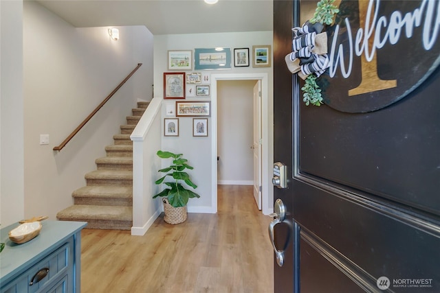 15539 Bergh Ct SE, Yelm, WA 98597 - entrance foyer with stairs and light wood-style flooring