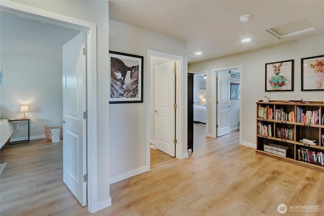 15539 Bergh Ct SE, Yelm, WA 98597 - corridor with attic access, light wood-style floors, and recessed lighting