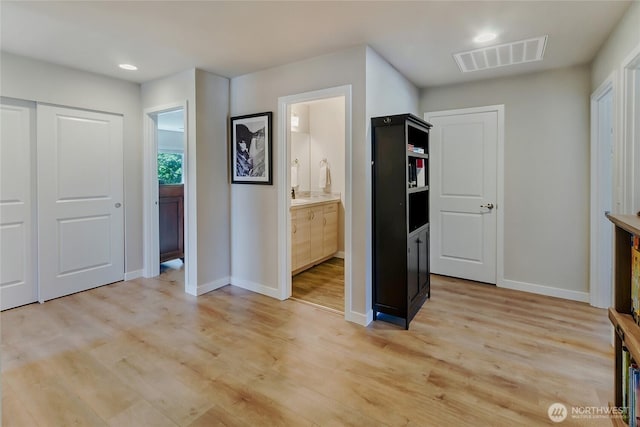 15539 Bergh Ct SE, Yelm, WA 98597 - bedroom with light wood finished floors, recessed lighting, connected bathroom, and a closet