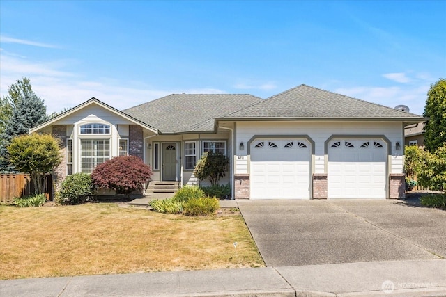 8051 283rd St NW, Stanwood, WA 98292 - ranch-style house featuring a garage, brick siding, driveway, and a shingled roof