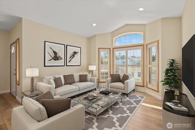 8051 283rd St NW, Stanwood, WA 98292 - living room featuring light wood finished floors, recessed lighting, and vaulted ceiling