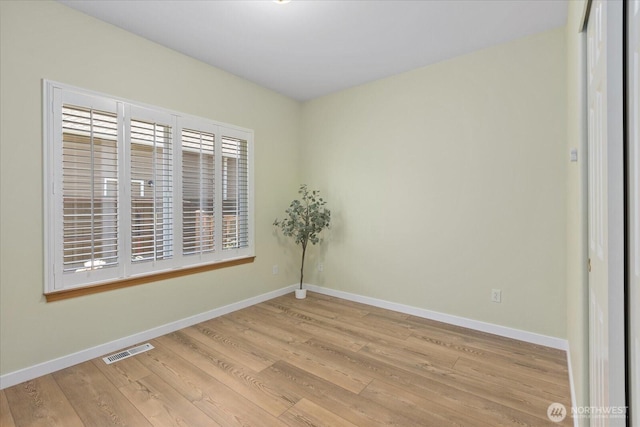 8051 283rd St NW, Stanwood, WA 98292 - empty room featuring light wood-style floors and baseboards