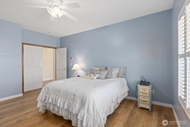 8051 283rd St NW, Stanwood, WA 98292 - bedroom featuring wood finished floors and a ceiling fan