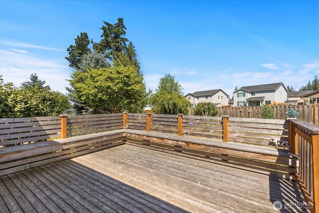 8051 283rd St NW, Stanwood, WA 98292 - wooden terrace with a fenced backyard and a residential view