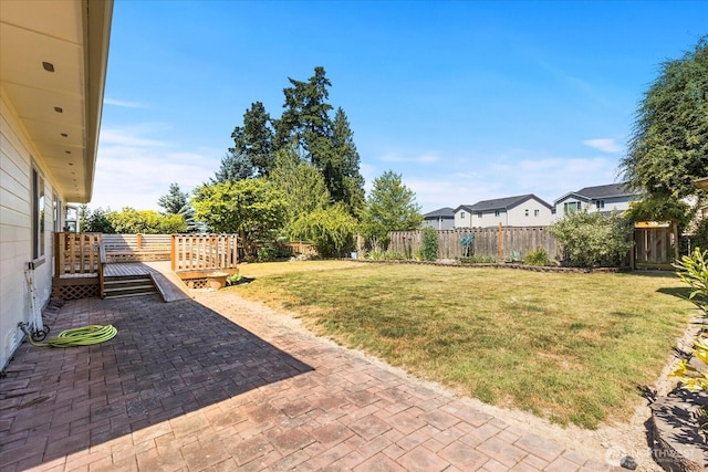 8051 283rd St NW, Stanwood, WA 98292 - fenced backyard featuring a patio area and a deck