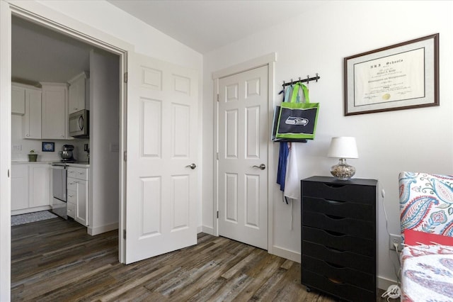 1156 Halsey Ave, Coupeville, WA 98239 - bedroom with dark wood-type flooring