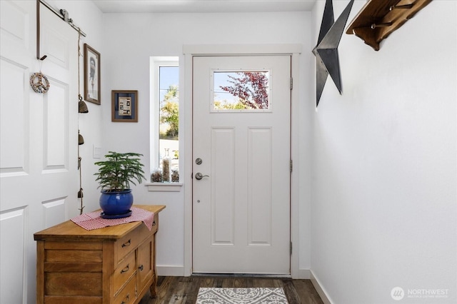 1156 Halsey Ave, Coupeville, WA 98239 - entryway featuring dark wood finished floors and baseboards