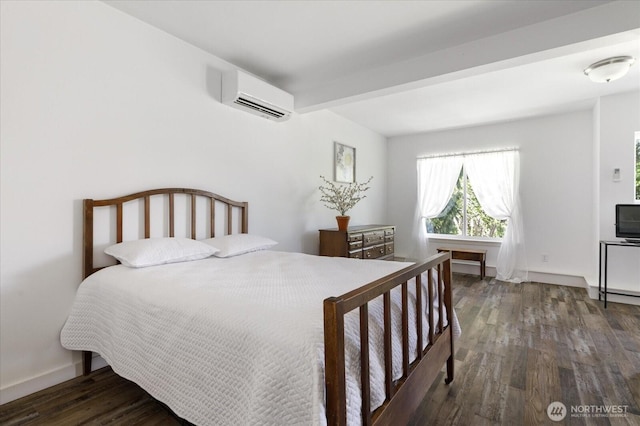 1156 Halsey Ave, Coupeville, WA 98239 - bedroom featuring a wall mounted AC, dark wood-type flooring, and beam ceiling