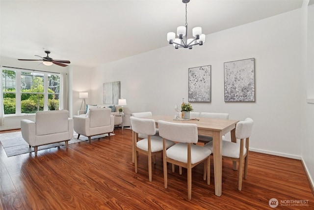 1899 NE Kenyon Ct, Issaquah, WA 98029 - dining room with a chandelier, wood finished floors, and a ceiling fan