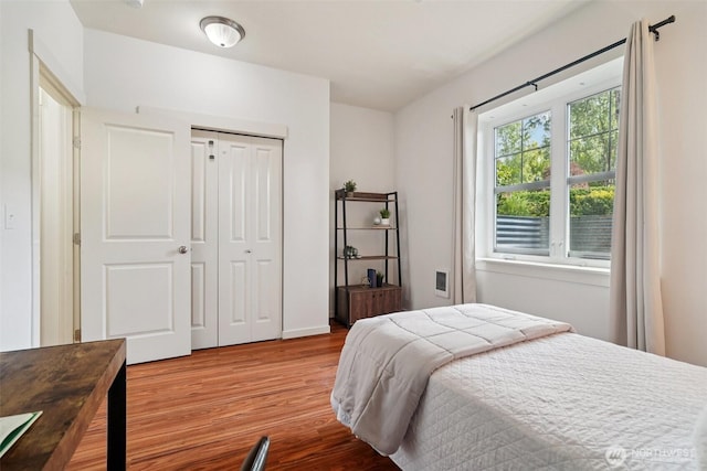 1899 NE Kenyon Ct, Issaquah, WA 98029 - bedroom featuring wood finished floors and a closet