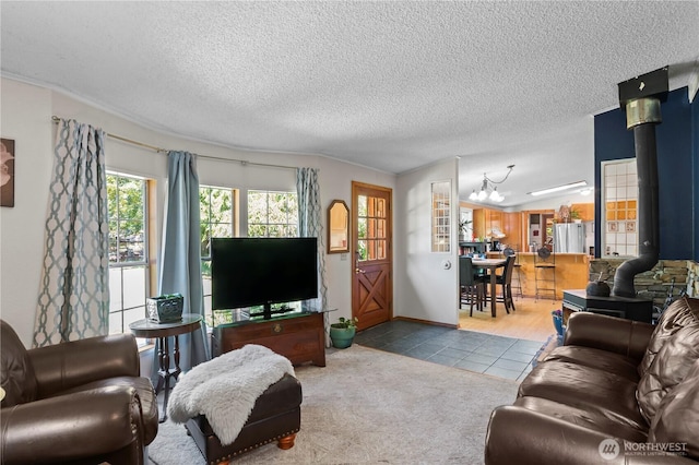 472 Iris Ln, Camano Island, WA 98282 - living area featuring a chandelier, a textured ceiling, and tile patterned floors