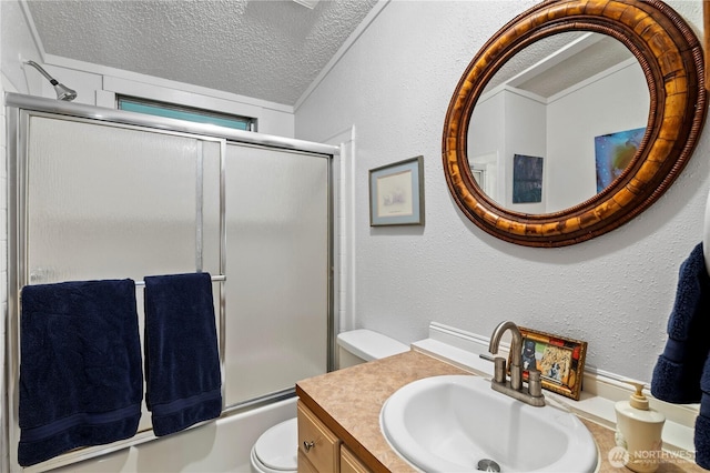 472 Iris Ln, Camano Island, WA 98282 - bathroom with a textured ceiling, shower / bath combination with glass door, a textured wall, and vanity