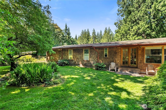 472 Iris Ln, Camano Island, WA 98282 - rear view of property with a yard and french doors