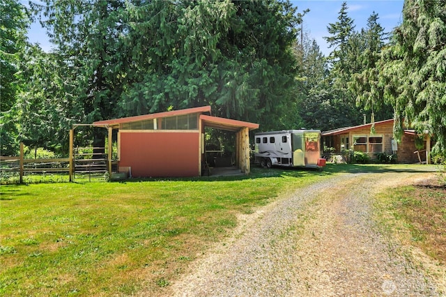 472 Iris Ln, Camano Island, WA 98282 - view of front of home with dirt driveway and an outdoor structure