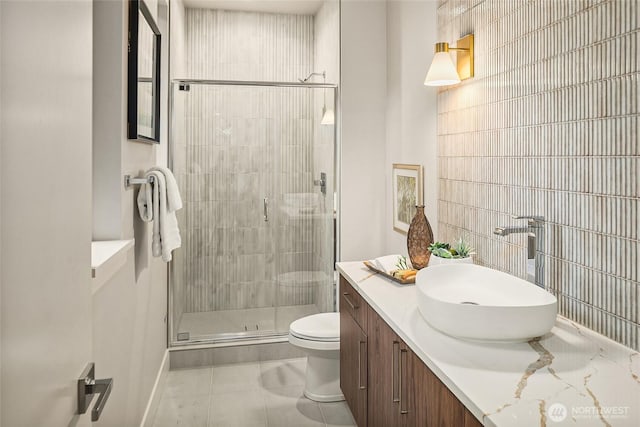 10915 126th Pl NE, Kirkland, WA 98033 - full bathroom with a stall shower, vanity, tile patterned floors, and tile walls