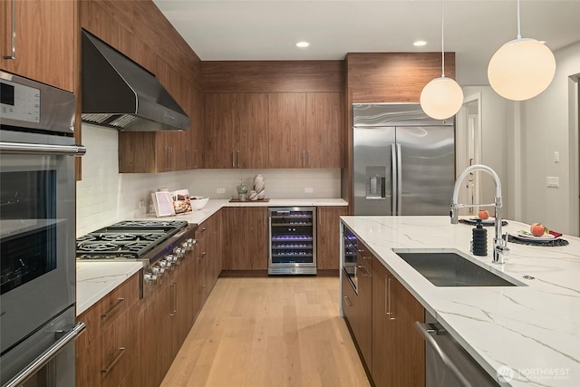 10915 126th Pl NE, Kirkland, WA 98033 - kitchen featuring wine cooler, stainless steel appliances, wall chimney exhaust hood, modern cabinets, and backsplash