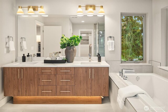 10915 126th Pl NE, Kirkland, WA 98033 - bathroom featuring double vanity and a bath