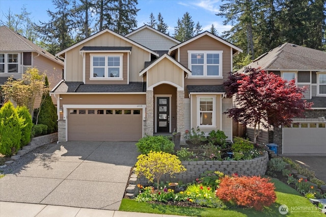 6010 155th St SW, Edmonds, WA 98026 - craftsman-style house featuring board and batten siding, a garage, concrete driveway, and stone siding