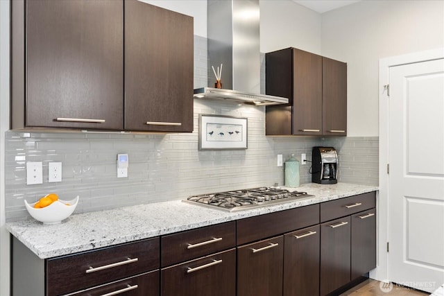6010 155th St SW, Edmonds, WA 98026 - kitchen with wall chimney exhaust hood, stainless steel gas cooktop, dark brown cabinets, and backsplash