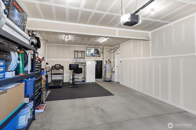 6010 155th St SW, Edmonds, WA 98026 - garage with a garage door opener and water heater