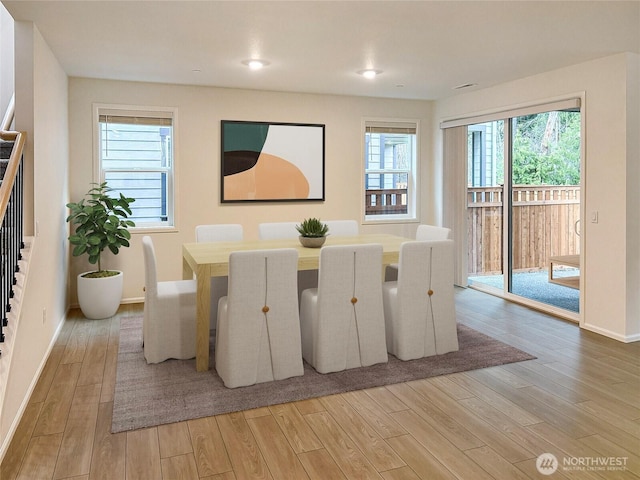 17911 139th Pl E, Puyallup, WA 98374 - dining space with light wood finished floors, stairway, and recessed lighting