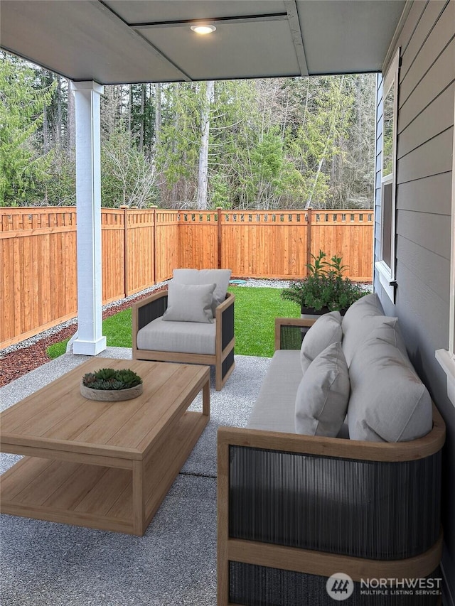 17911 139th Pl E, Puyallup, WA 98374 - fenced backyard with an outdoor hangout area and a patio