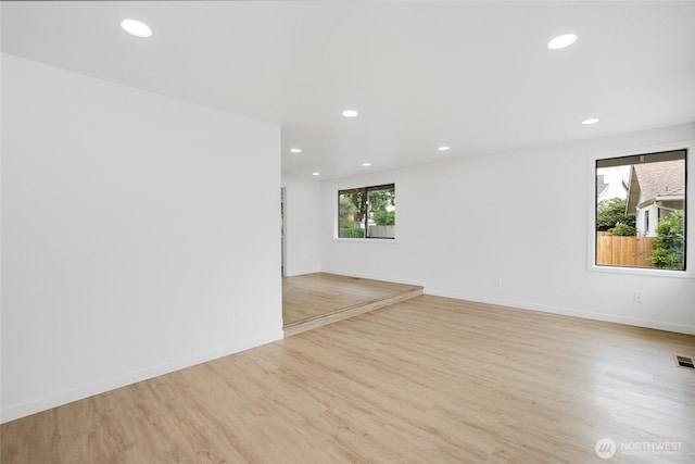 1308 133rd St S, Tacoma, WA 98444 - spare room with recessed lighting and light wood-style floors