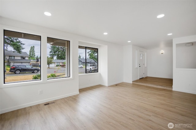 1308 133rd St S, Tacoma, WA 98444 - spare room with light wood-style floors and recessed lighting