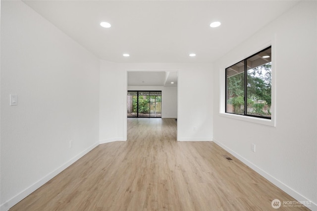 1308 133rd St S, Tacoma, WA 98444 - unfurnished room with light wood-style flooring and recessed lighting