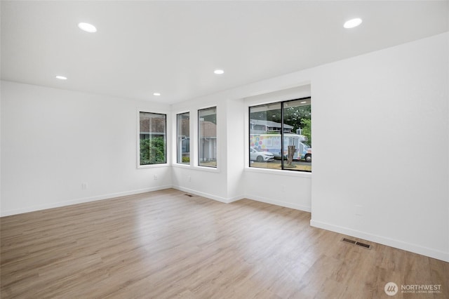 1308 133rd St S, Tacoma, WA 98444 - spare room featuring light wood-style floors and recessed lighting