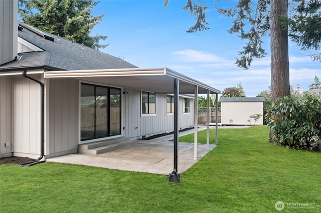 1308 133rd St S, Tacoma, WA 98444 - rear view of property with a shingled roof, a storage shed, and a patio