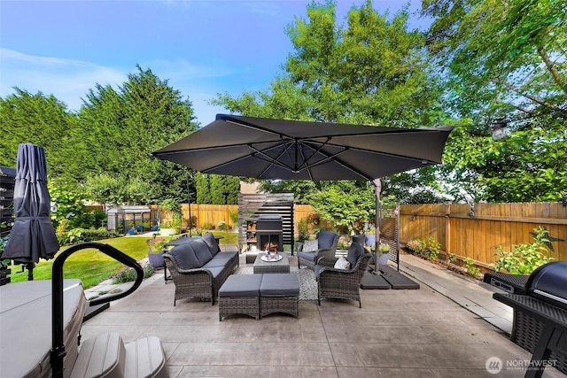 6008 S Bakerview Park Dr, Ferndale, WA 98248 - fenced backyard with a patio area, an outdoor hangout area, and a grill