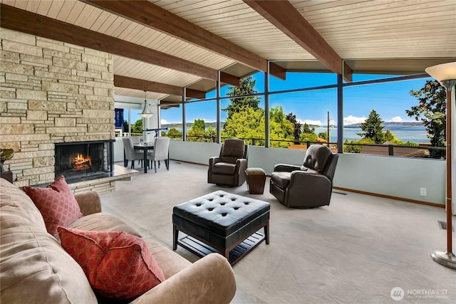 29812 Marine View Dr SW, Federal Way, WA 98023 - carpeted living area with baseboards and a stone fireplace