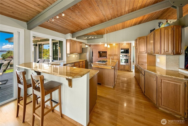 29812 Marine View Dr SW, Federal Way, WA 98023 - kitchen featuring stainless steel appliances, decorative backsplash, a center island, light wood-style floors, and wooden ceiling