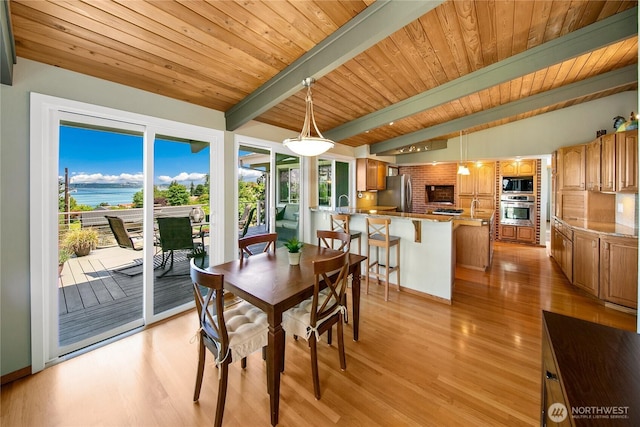 29812 Marine View Dr SW, Federal Way, WA 98023 - dining room with wooden ceiling, light wood-style floors, and a water view
