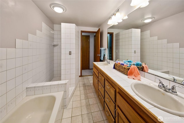 29812 Marine View Dr SW, Federal Way, WA 98023 - full bathroom with a tub to relax in, double vanity, tile patterned floors, and tiled shower