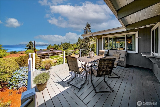 29812 Marine View Dr SW, Federal Way, WA 98023 - wooden terrace with a water view and outdoor dining area