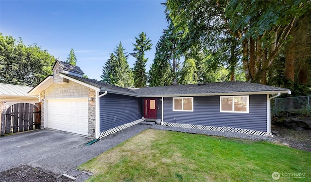 21313 2nd Dr SE, Bothell, WA 98021 - ranch-style house featuring a garage, asphalt driveway, and stone siding