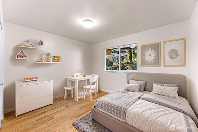 21313 2nd Dr SE, Bothell, WA 98021 - bedroom featuring light wood finished floors and baseboards