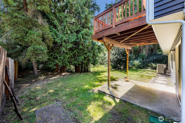 21313 2nd Dr SE, Bothell, WA 98021 - fenced backyard with a wooden deck and a patio area
