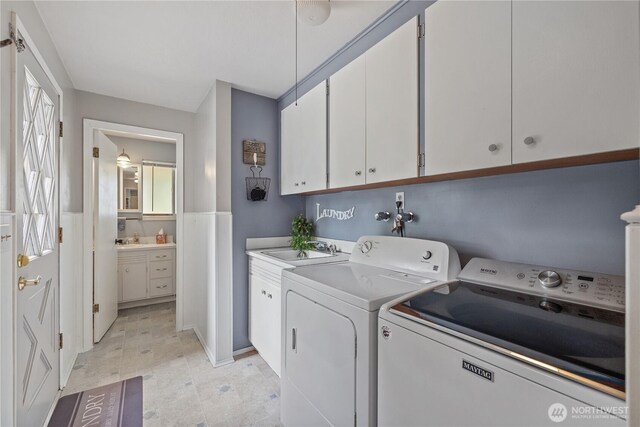 23019 Arlington Heights Rd, Arlington, WA 98223 - washroom featuring cabinet space and washing machine and dryer
