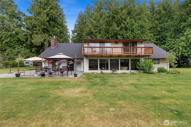23019 Arlington Heights Rd, Arlington, WA 98223 - rear view of property with a gazebo, a chimney, a lawn, a patio area, and a wooden deck