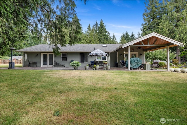 23019 Arlington Heights Rd, Arlington, WA 98223 - back of house featuring french doors, a patio, and a yard