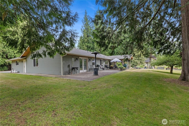 23019 Arlington Heights Rd, Arlington, WA 98223 - rear view of property with french doors, a lawn, and a patio area