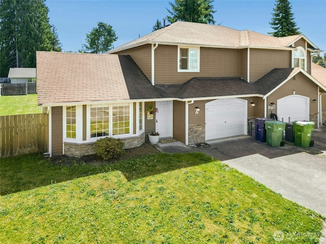 2427 Spruce Rd, Lake Stevens, WA 98258 - traditional-style home featuring stone siding, driveway, an attached garage, and roof with shingles