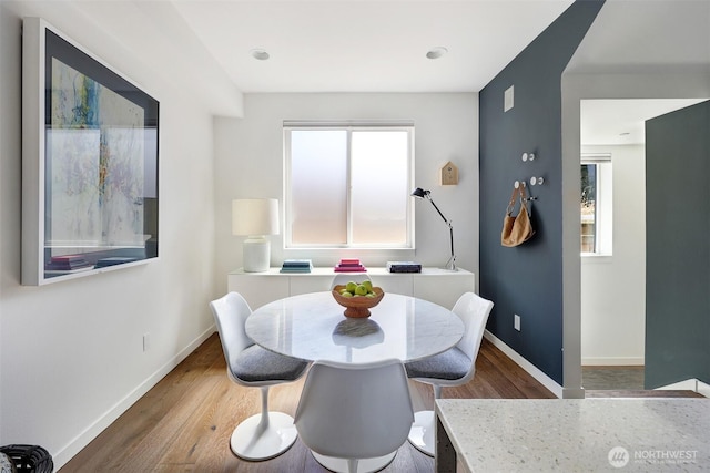 1117 34th Ave Unit B, Seattle, WA 98122 - dining room with wood finished floors and baseboards