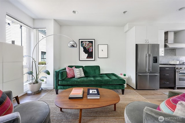 1117 34th Ave Unit B, Seattle, WA 98122 - living area featuring light wood-style flooring and recessed lighting