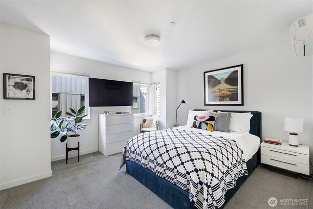 1117 34th Ave Unit B, Seattle, WA 98122 - carpeted bedroom with baseboards and a wall mounted air conditioner