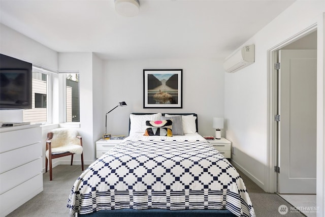 1117 34th Ave Unit B, Seattle, WA 98122 - bedroom featuring light colored carpet and a wall mounted air conditioner